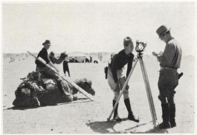 Image of researchers performing a geographical survey of the Gobi Desert.